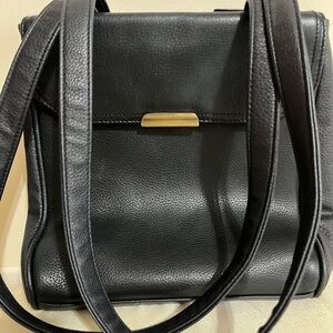 Sleek Black Leather Shoulder Bag with Gold Accents
